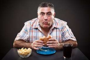 man eating burger
